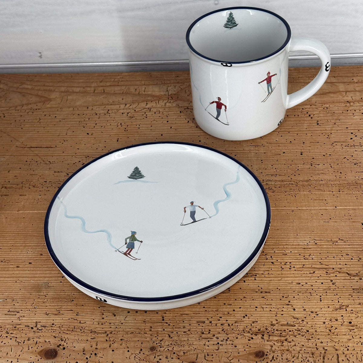 Frühstücksteller blauer Rand mit Schifahrern und Wedelspuren, Dessertteller