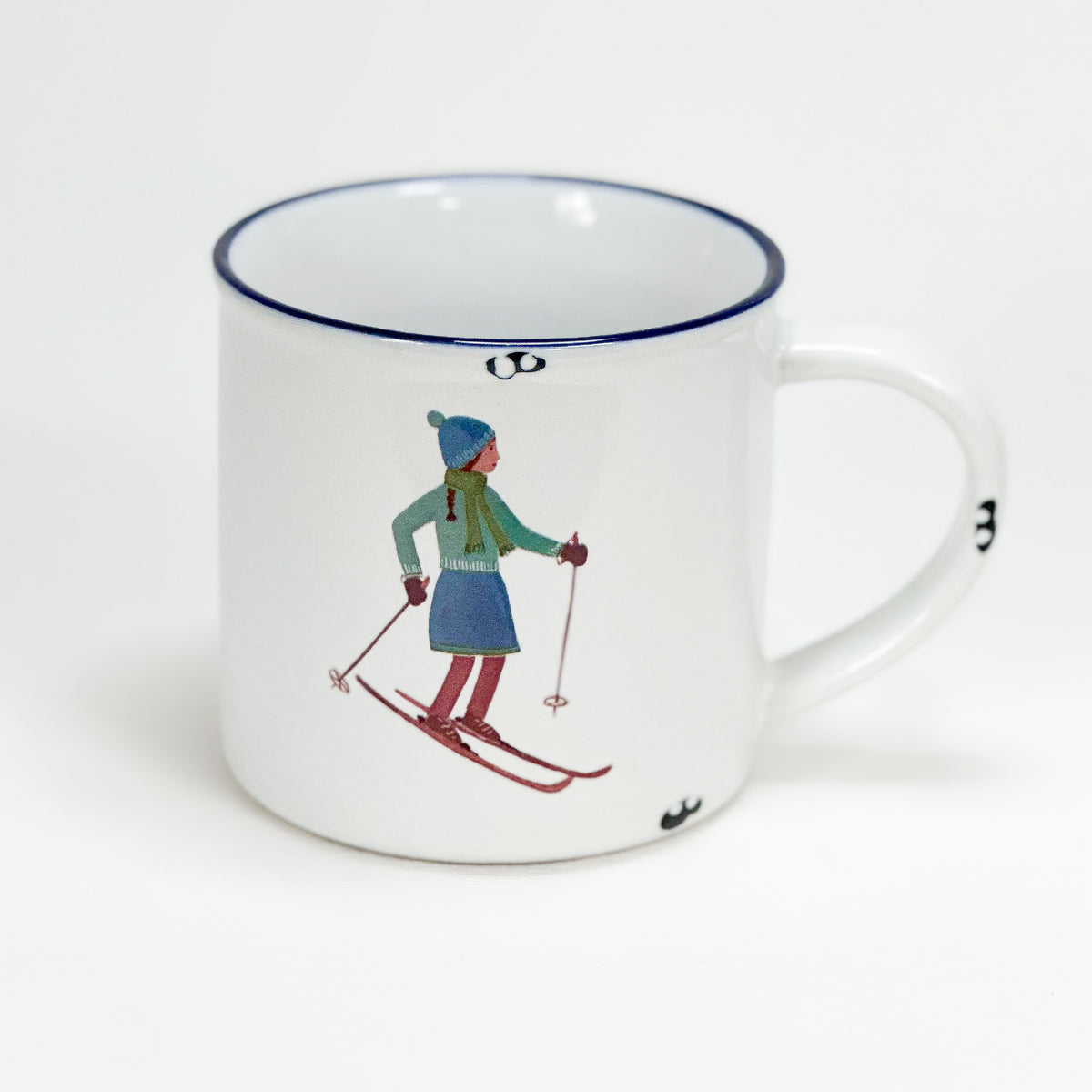 Vintage Keramiktasse im Emaille-look mit einem Skifahrer Mädchen
