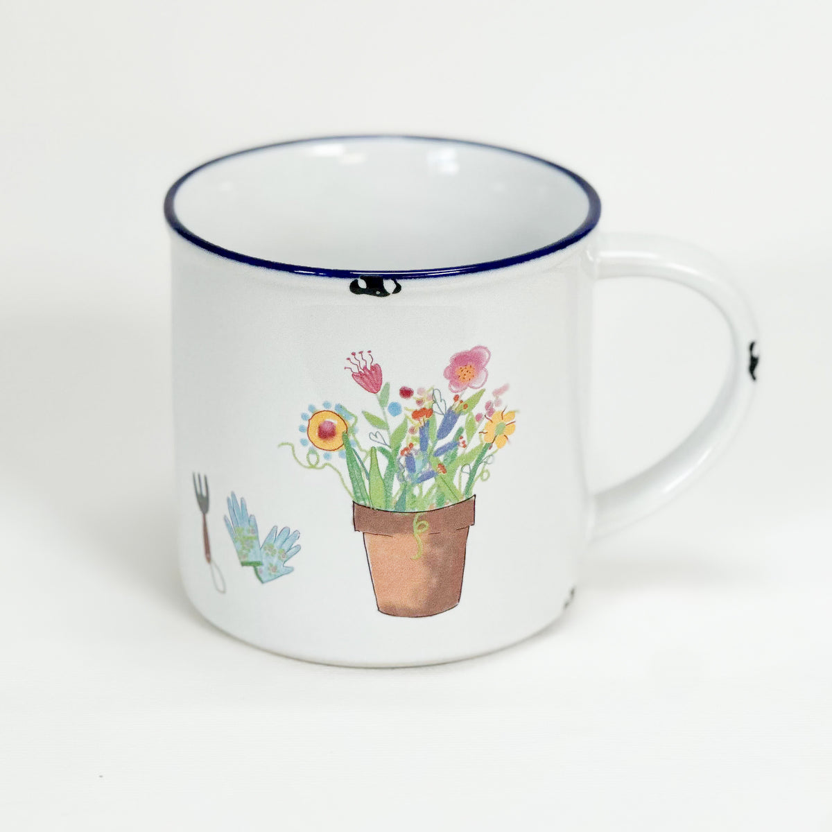 Vintage Keramiktasse im Emaille-look mit einem Blumentopf