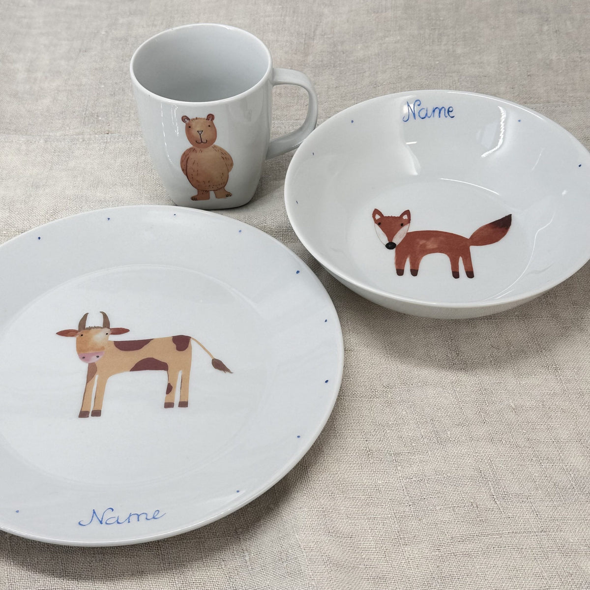 Produkt mit Kindergeskirr mit Tieren, Kindergeskirr mit Tieren, Produkt, Winterkollektion, Barbara's Porzellanwerkstatt