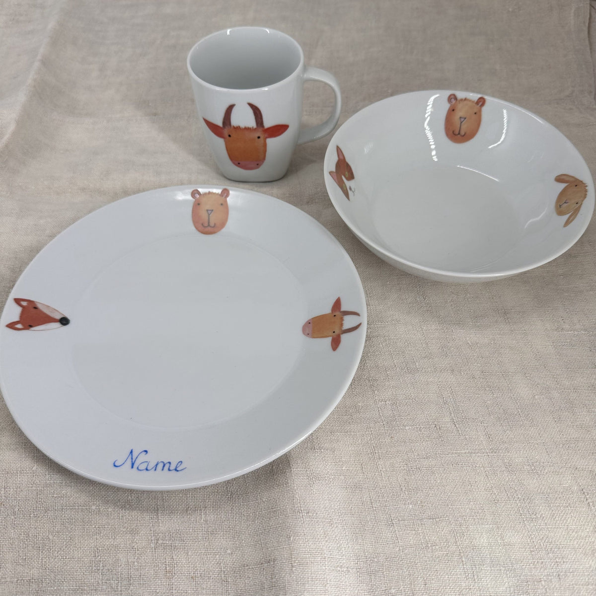 Produkt mit Kindergeskirr mit Tieren, Kindergeskirr mit Tieren, Produkt, Winterkollektion, Barbara's Porzellanwerkstatt